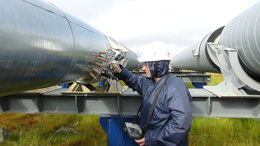 Fragment of a gas pipeline inspection through the insulation layer